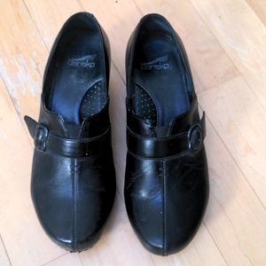 Dansko black slip on clogs size 39 (women's size 8.5-9). Hardly worn!